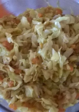 A picture of Fried cabbage with carrots.