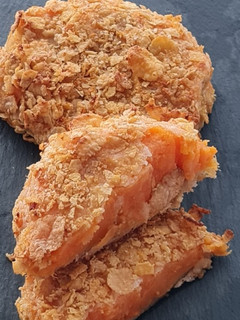 Una foto de Medallón de boniato asado con parmesano y Corn Flakes