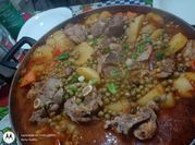 Una foto de ossobuco cebolla