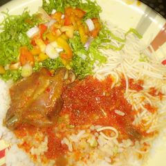 A picture of Rice #stew with salad.