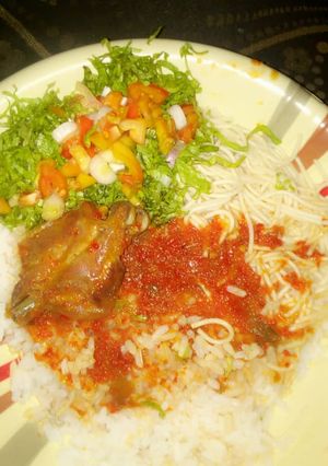 A picture of Rice #stew with salad.