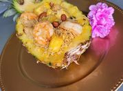 Una foto de cebollino con arroz frita