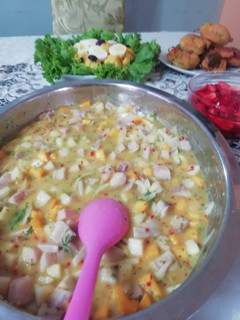 Una foto de Ceviche de pescado con pera y mango!!