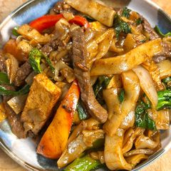 A picture of Thai Drunken Noodles w/ Beef & Tofu| Pad Kee Mao.