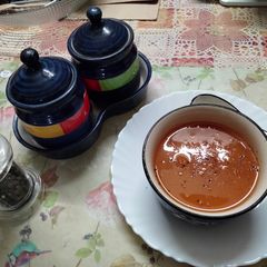 A picture of Tomato and carrot soup with Malka masoor dal.