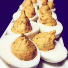 A picture of Curry stuffed eggs.