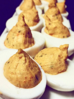 A picture of Curry stuffed eggs.