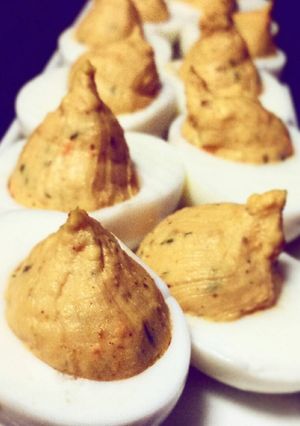A picture of Curry stuffed eggs.