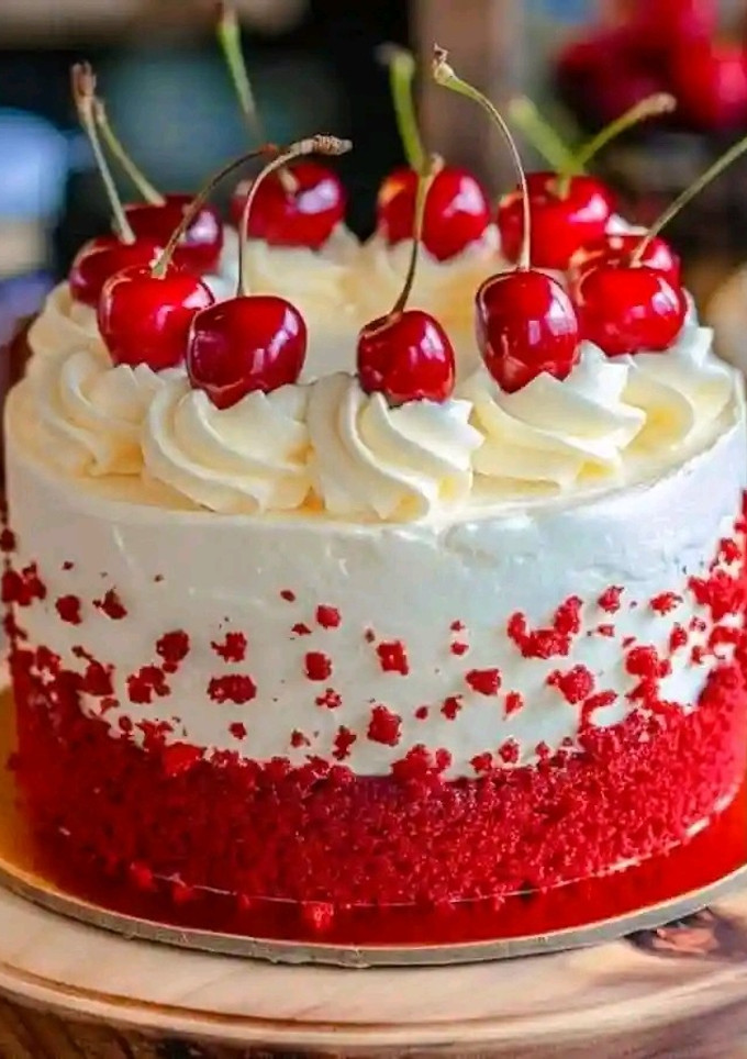 A picture of Cherry Cake with Cherry Cream Cheese Frosting.