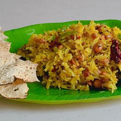 A picture of Green raw mango rice.