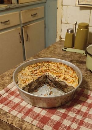 Una foto de Cocina de subsistencia: Pudín Rústico de Pan Anejado al Caldo de Lentejas
