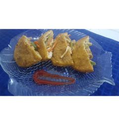 A picture of Chicken white sauce pockets.