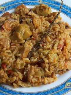 Una foto de Arroz con carne y setas