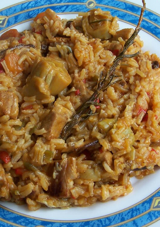 Una foto de Arroz con carne y setas