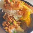 Cơm nghêu xào bơ