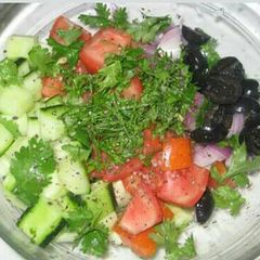 A picture of Cucumber and tomato salad.