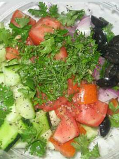 A picture of Cucumber and tomato salad.