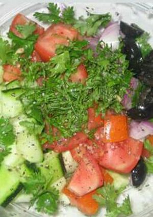 A picture of Cucumber and tomato salad.