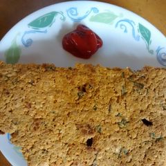 A picture of Oats And Spinach Thalipeeth.