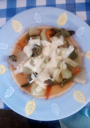 Una foto de Chayotes con rajas y quesillo