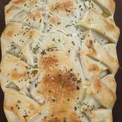 Una foto de Trenza de Cebolla y Queso 🧅🧀