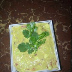 A picture of Guac with a banana.