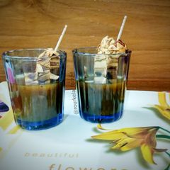 A picture of Crispy paneer papadam with garlic chilli shots.