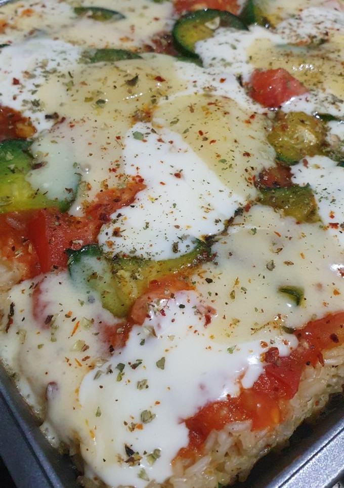 Una foto de Pizza de arroz integral 🍚🍕
