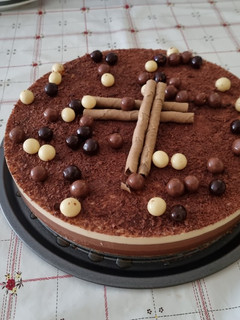 Una foto de Tarta tres chocolates