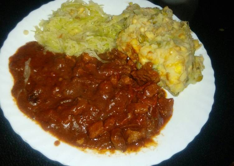 Beef stew (garam masala) with steamed cabbage and mukimo