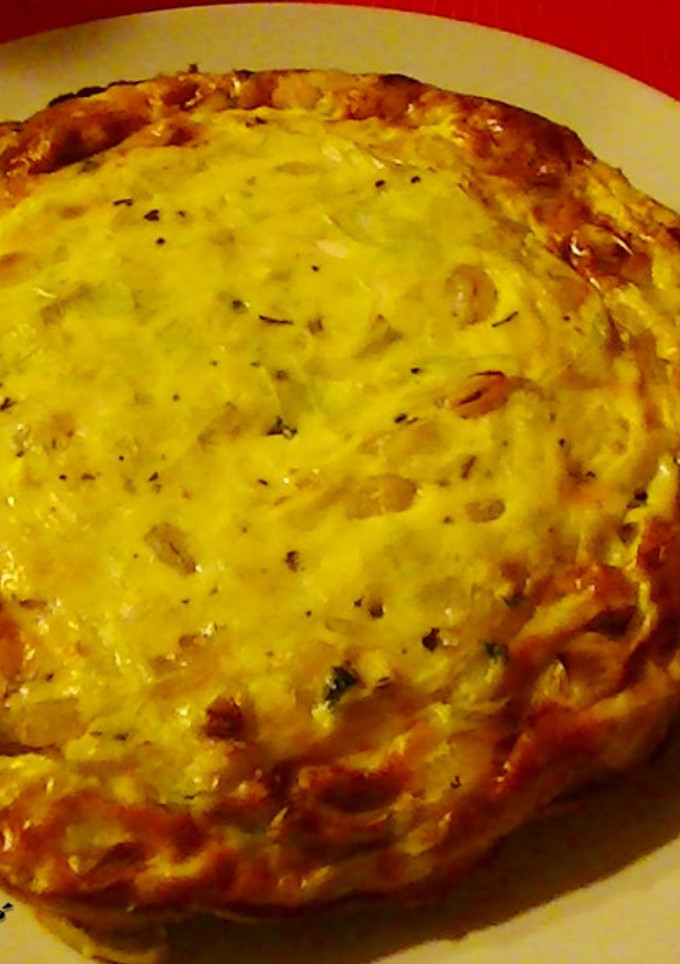 Una foto de Pastel de puerro y gambas