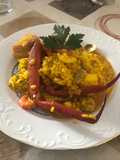 Arroz con cuerpos, gambas rojas y filete de cerdo