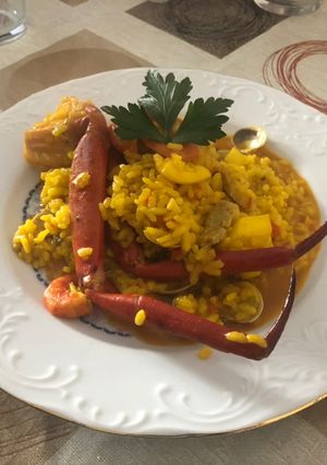 Una foto de Arroz con cuerpos, gambas rojas y filete de cerdo