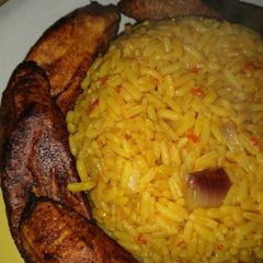 A picture of Red party jollof wit plantain(signature Maggi seasoning).