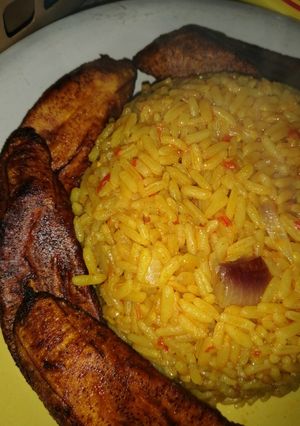 A picture of Red party jollof wit plantain(signature Maggi seasoning).