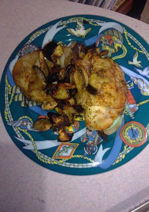 A picture of Chicken with aubergines in air fryer.