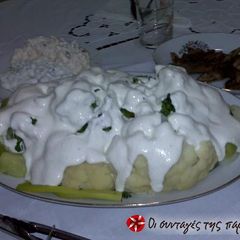 Cauliflower and broccoli with feta cheese sauce A picture of Cauliflower and broccoli with feta cheese sauce.