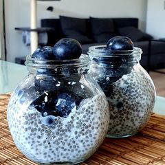 A picture of Chia pudding: Blueberries & coconut 🥥💙.