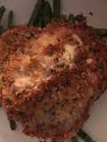 Herb crusted pork schnitzel with garlic parmesan green beans