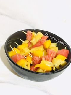 A picture of Fruit kebabs.