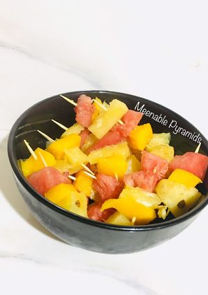A picture of Fruit kebabs.