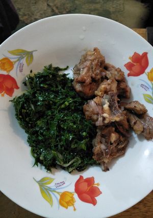 A picture of Fried mutton with greens.