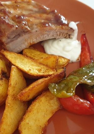 Una foto de 🍊Costillas al horno con naranja y salsa barbacoa