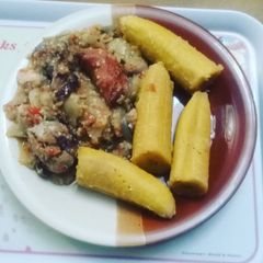 A picture of Garden egg sauce with unripe plantain.