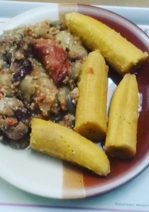 A picture of Garden egg sauce with unripe plantain.