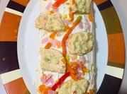 Una foto de piononos con atun