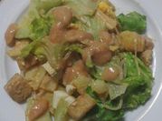 Una foto de ensalada espinacas con pasta