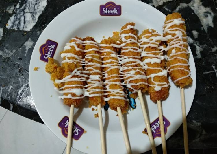 Sosis in a stick with mayonnaise