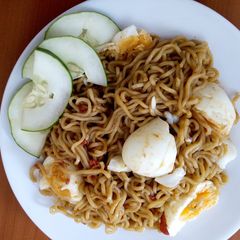 A picture of Indomie with boiled Eggs.