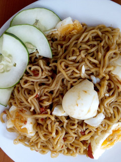 A picture of Indomie with boiled Eggs.